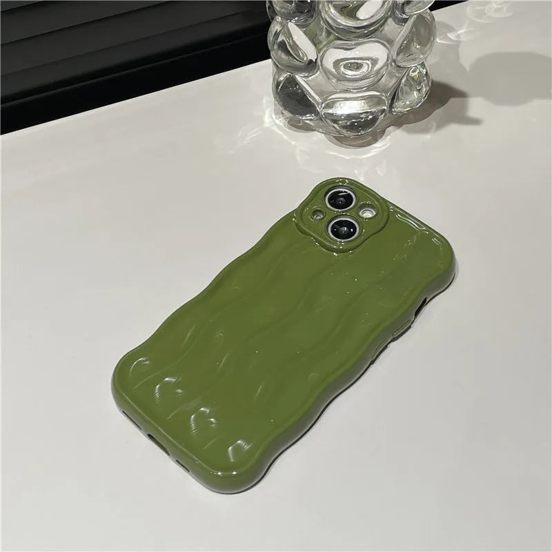 Silicone iPhone 17 case with water ripple texture in burgundy, green, silver, purple, and beige colour options