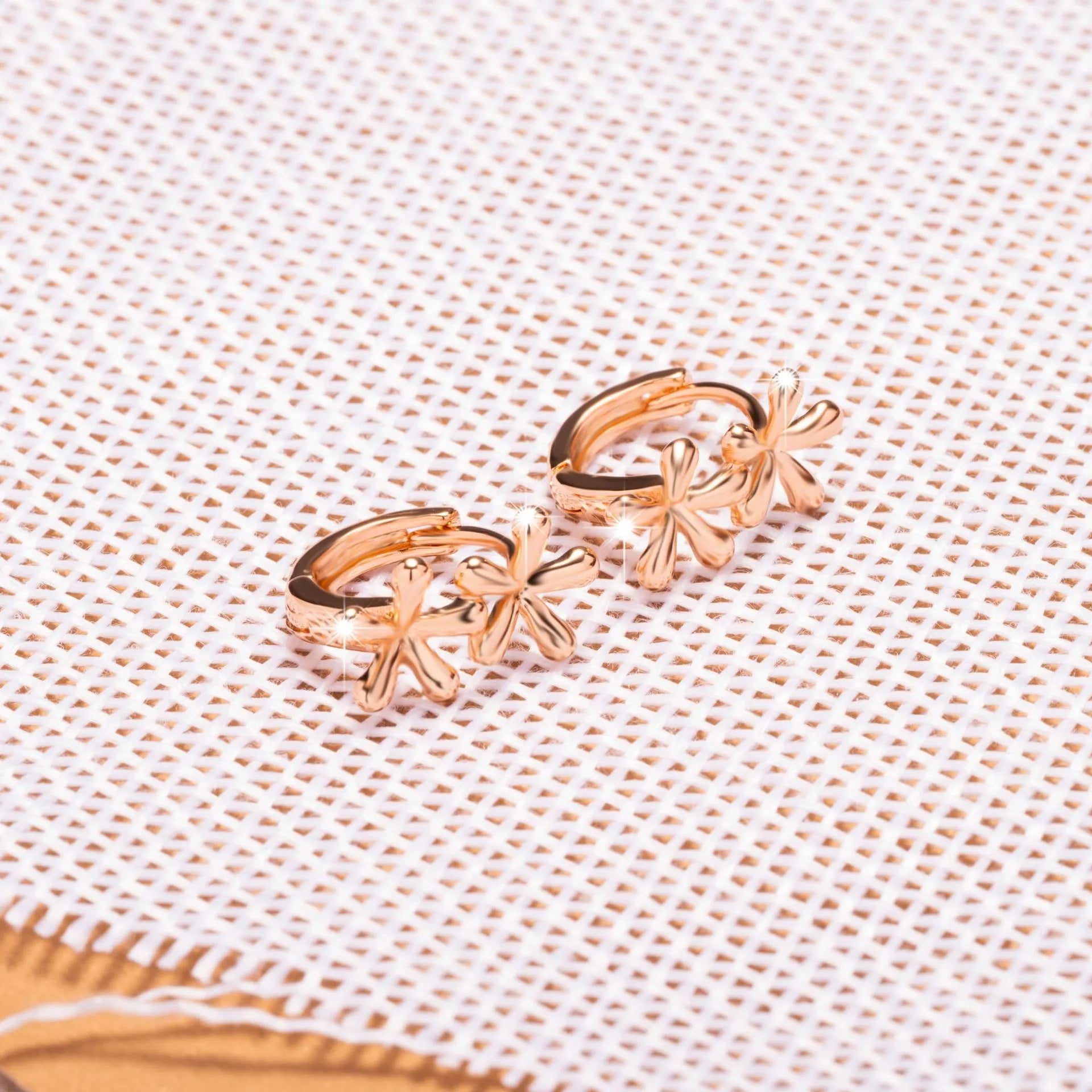 Rose gold waterdrop flower earrings with circular shape and electroplated finish