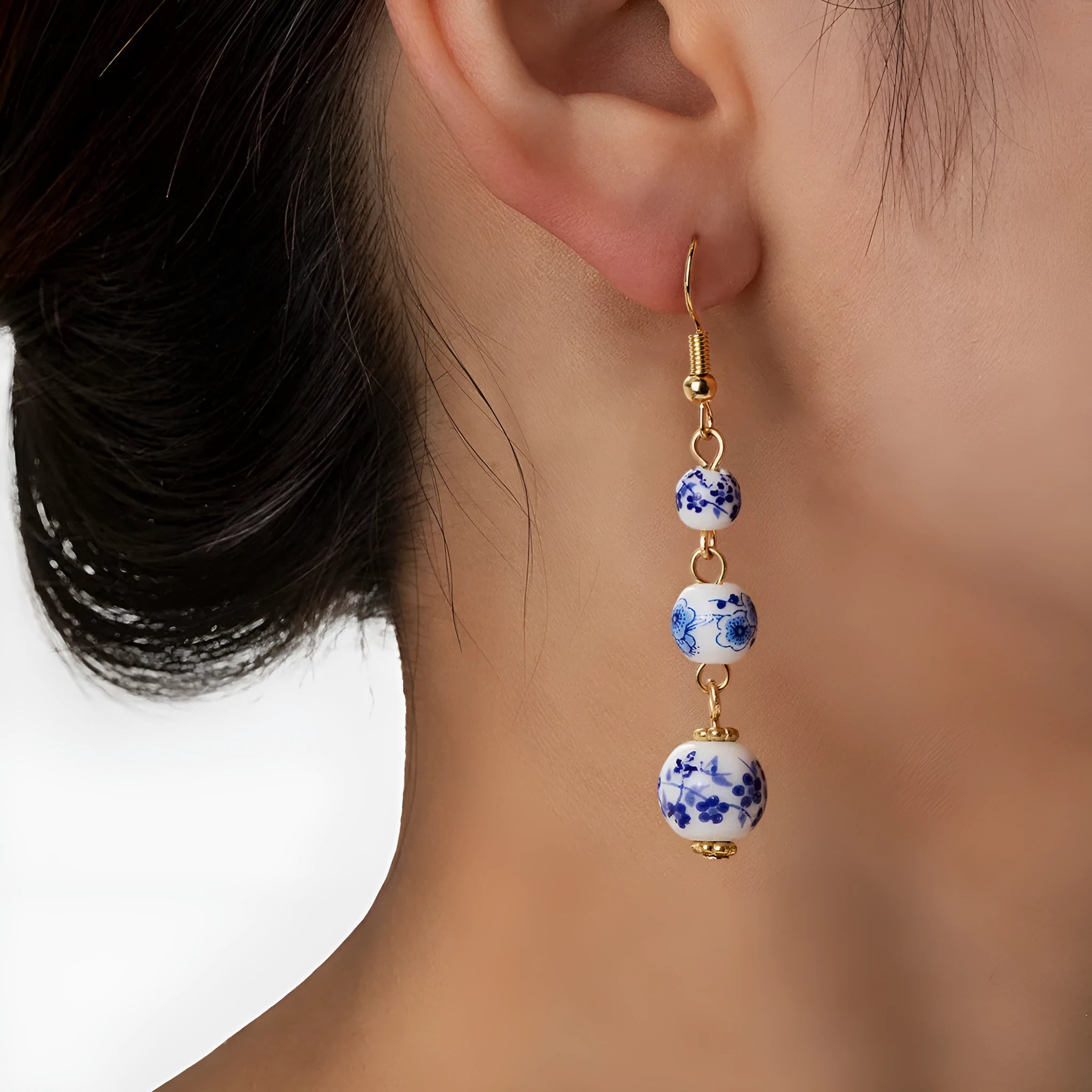 Blue and white porcelain ceramic bead long retro earrings with geometric round design and alloy electroplated finish