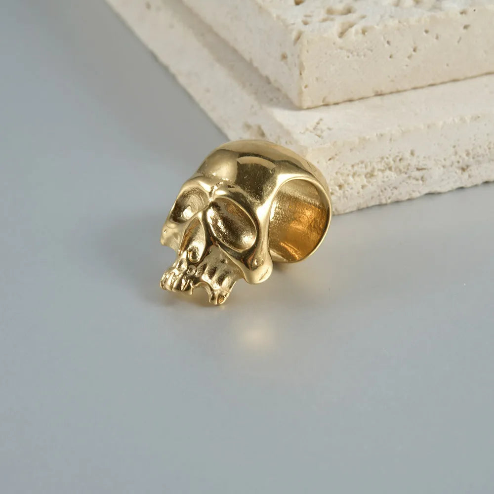 Stainless steel hollow skull Buddha earrings with geometric design in electroplated colours