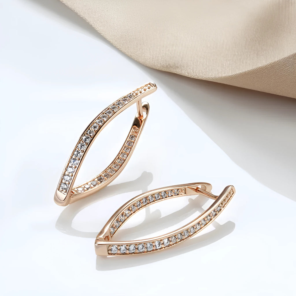 Copper geometric stud earrings with zircon details in H0493 colour.