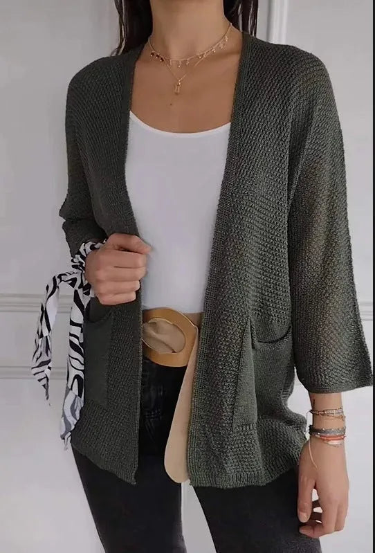 Women's thin waffle weave cardigan coat in army green with nine-quarter sleeves and pockets.