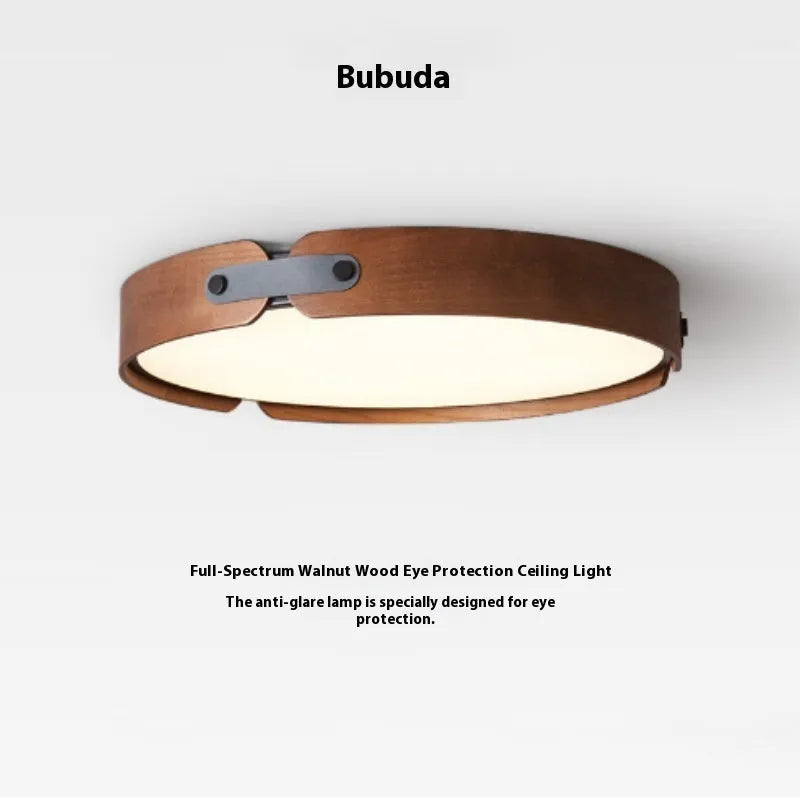 Japanese style wooden ceiling lamp with a round PMMA lampshade in warm light colour.
