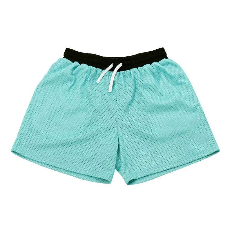 Men's mesh quick-drying shorts in solid colours for running and fitness.
