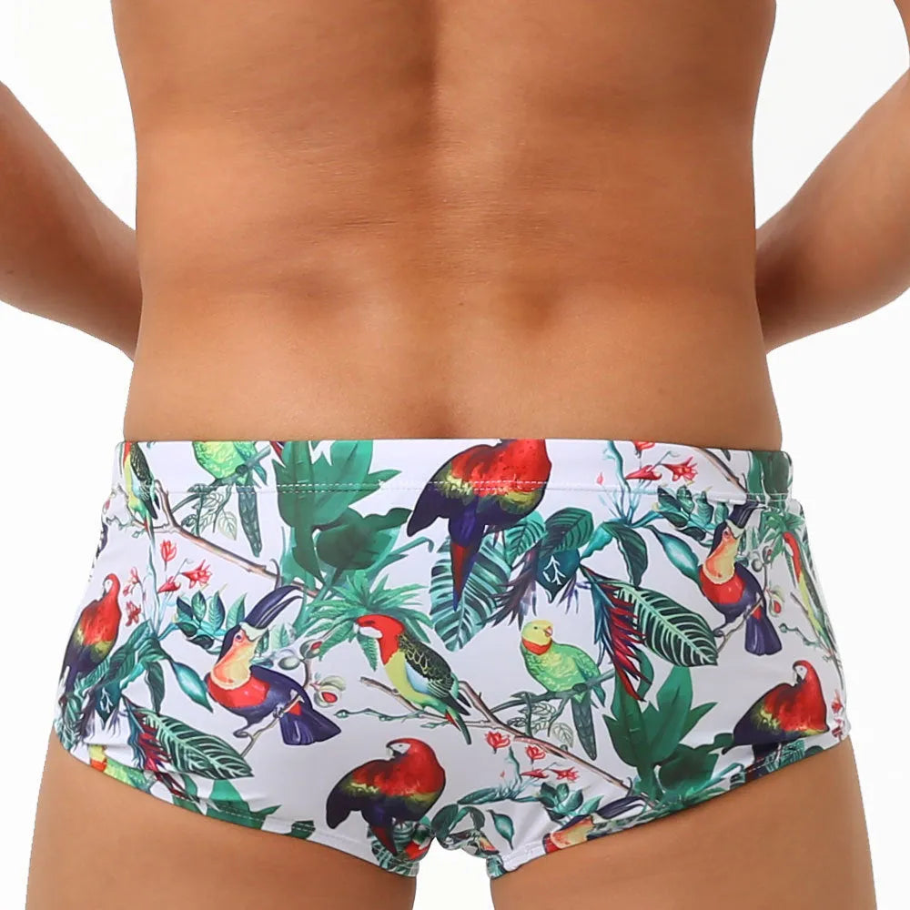 Men's floral print nylon swimming trunks with a cup cover, shown in the 619 flowers and birds colour pattern.
