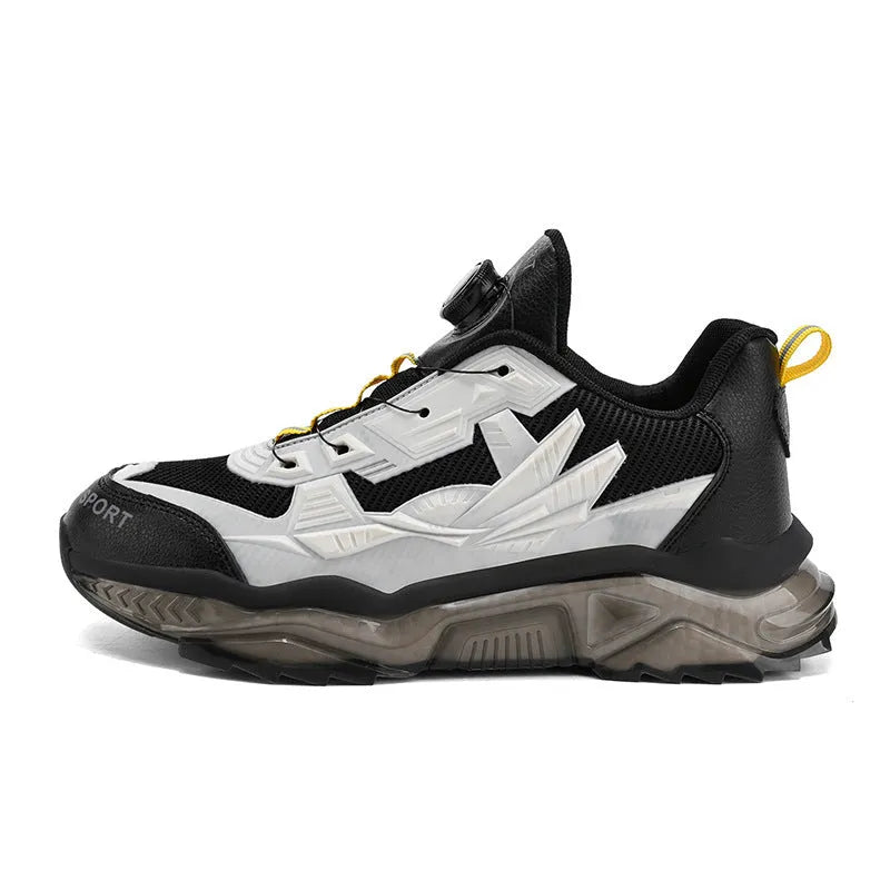 Men's black casual sneakers with a rotating button closure and low-top design.