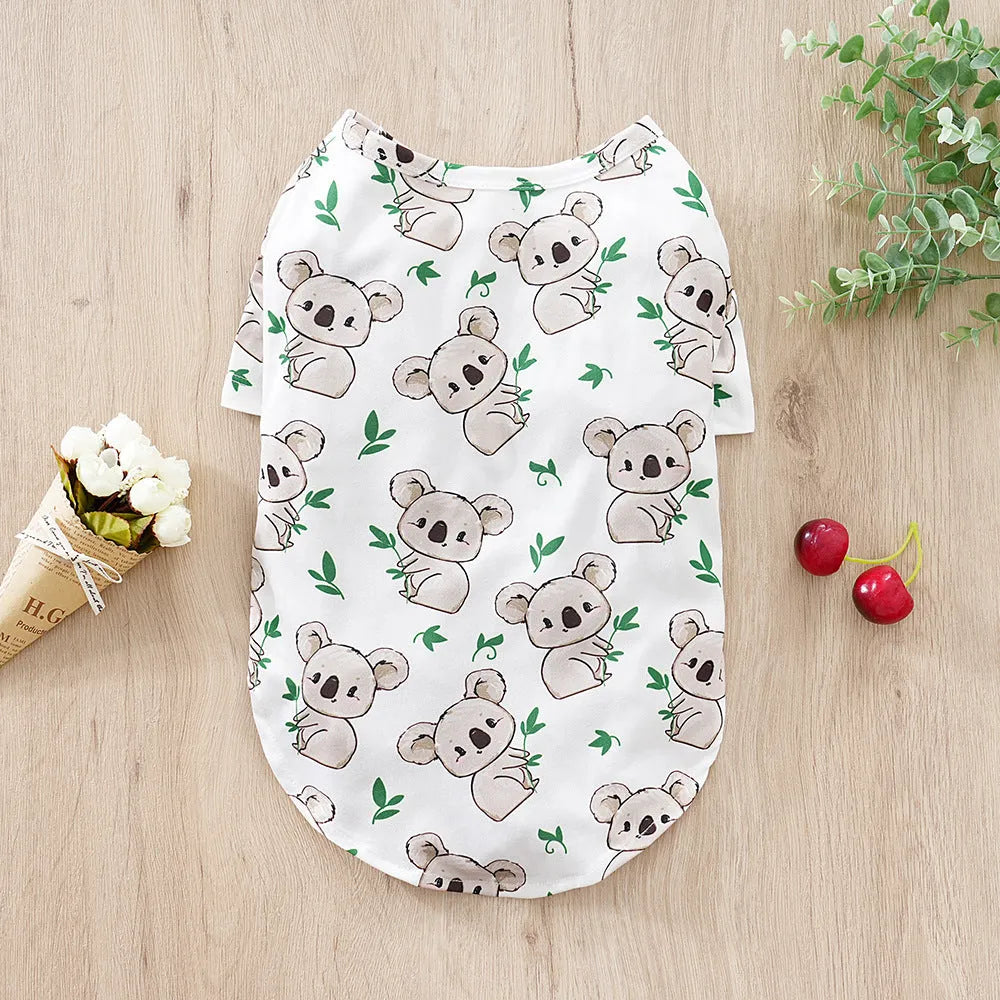 Printed polyester t-shirt for a small dog on a white background, showing colour and design.