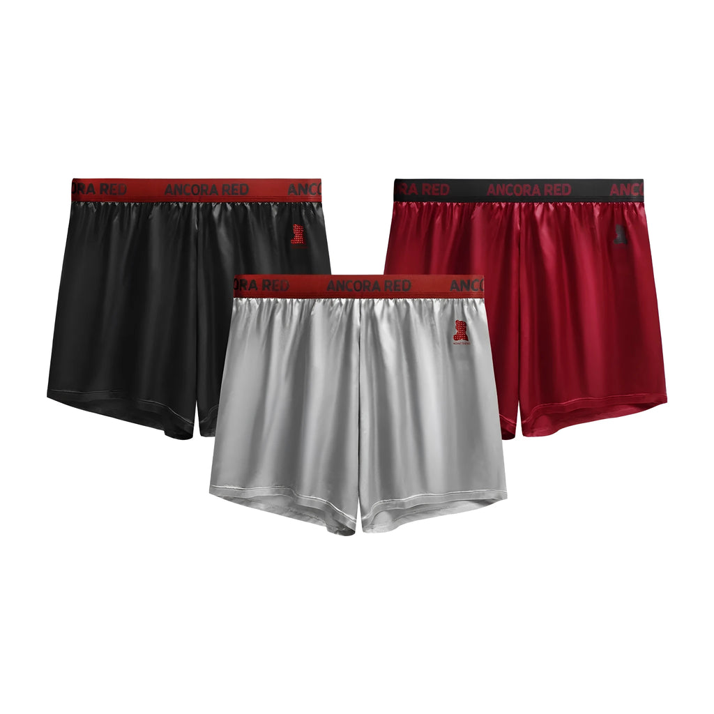 Men's solid colour boxer briefs in black, shown with mid waist design.