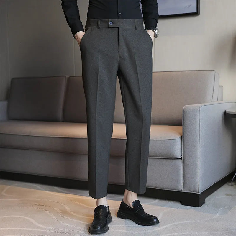 Men's straight fit brown corduroy trousers with elastic waistband on hanger