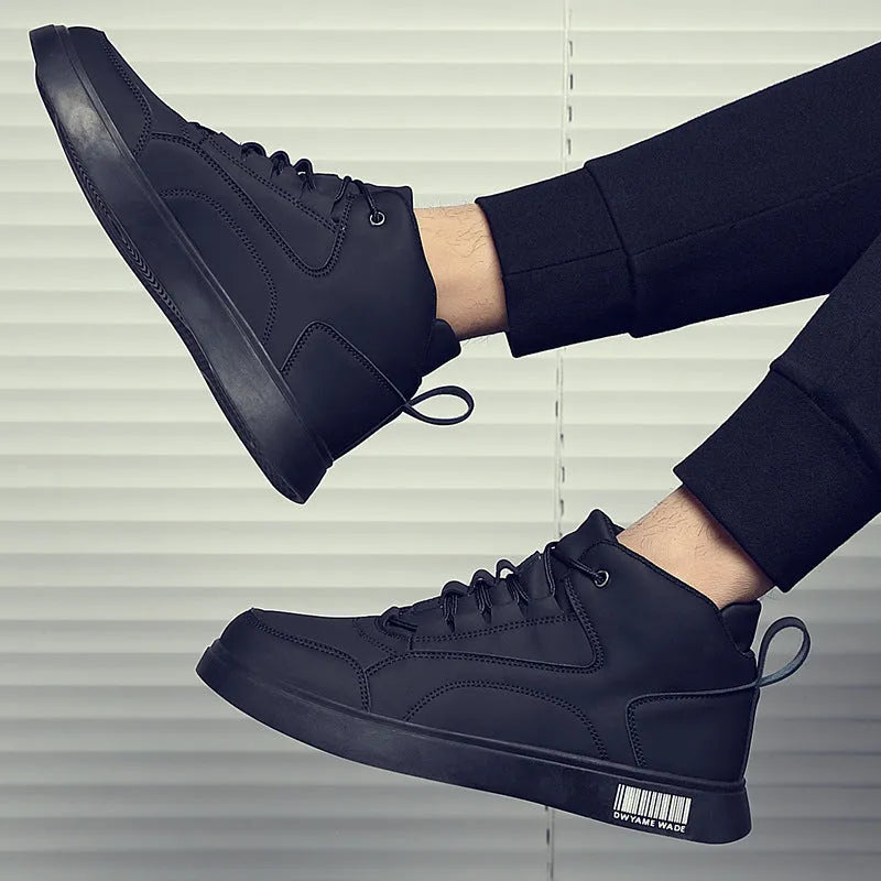 Men's white mid-top board shoes with round toe and flat rubber sole on grey background