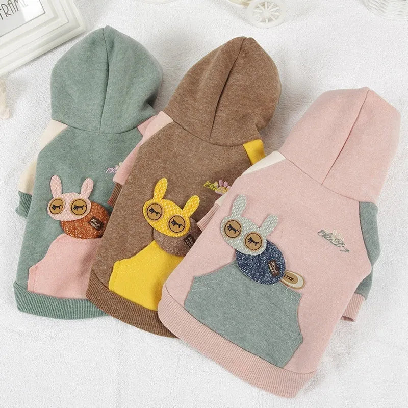 A brown cotton blend dog sweatshirt shown on a mannequin, size label visible.