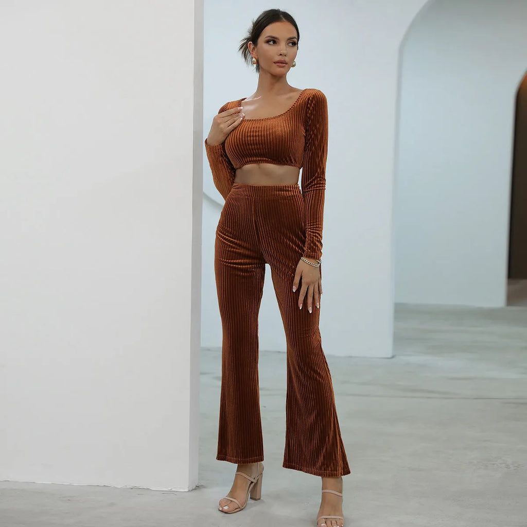 Caramel coloured long sleeve sweater and trousers casual set laid flat.