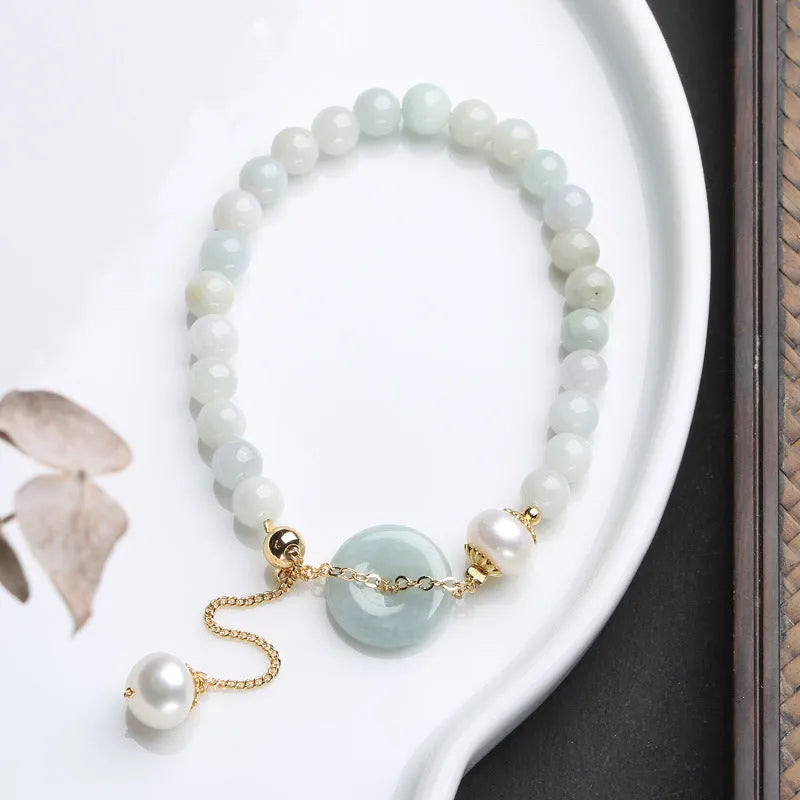 Jade and pearl bracelet with emerald peace buckle clasp and round pendant