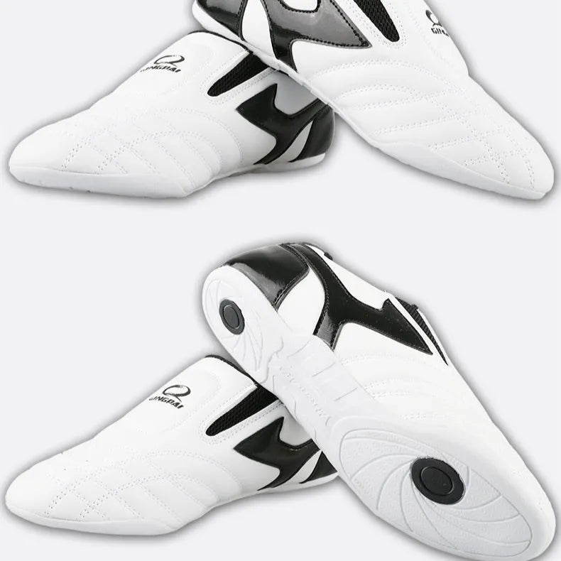 Black and white children's PU martial arts training shoes with soft sole for Taekwondo and Sanda.