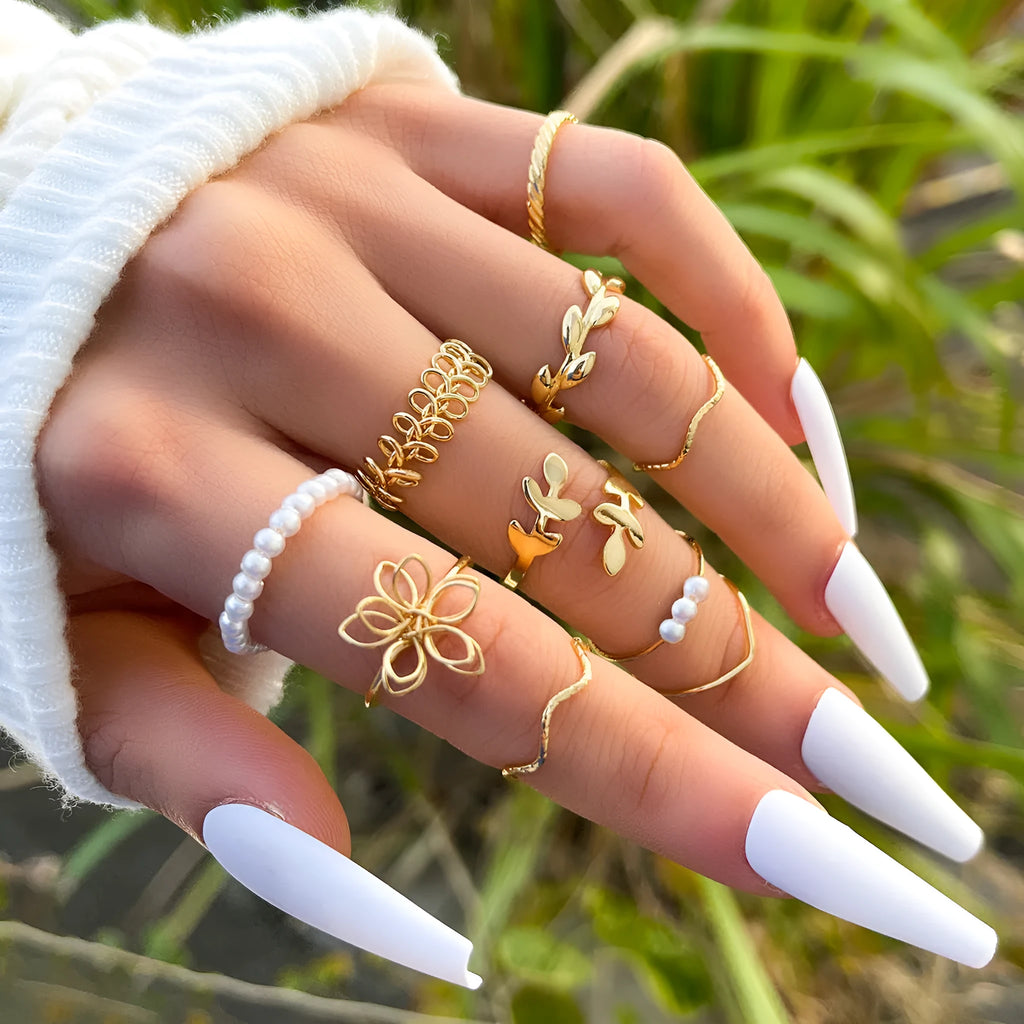 Women's openwork flower ring in electroplated alloy with gold J0656 colour and glossy finish