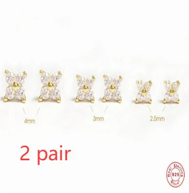 S925 sterling silver stud earrings with a petal-shaped crystal flower in gold or platinum finish.