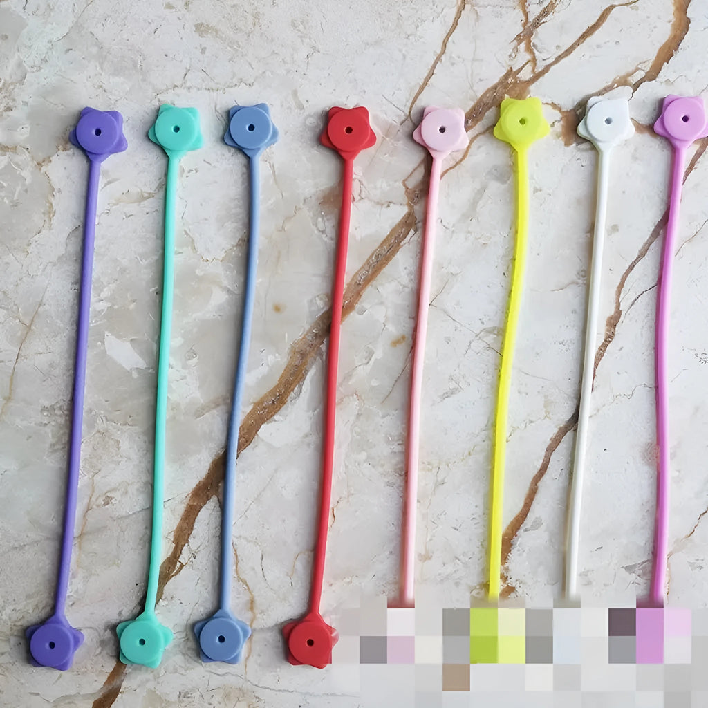 Star magnet silicone wire winder clip in various colours showing wire organisation function