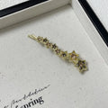 Gold-coloured rhinestone barrette clip with star charm for bangs