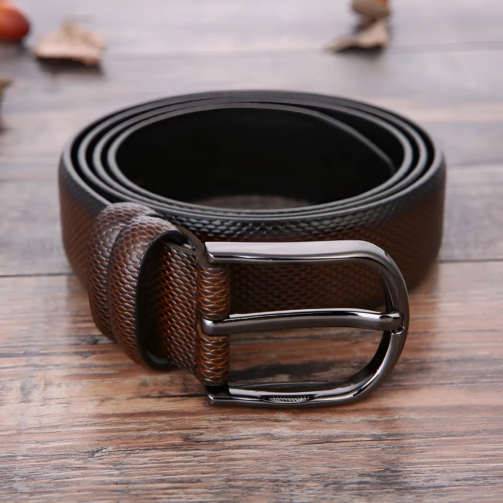 Men's black imitation leather business belt with an alloy pin buckle and laser logo elephant pattern.