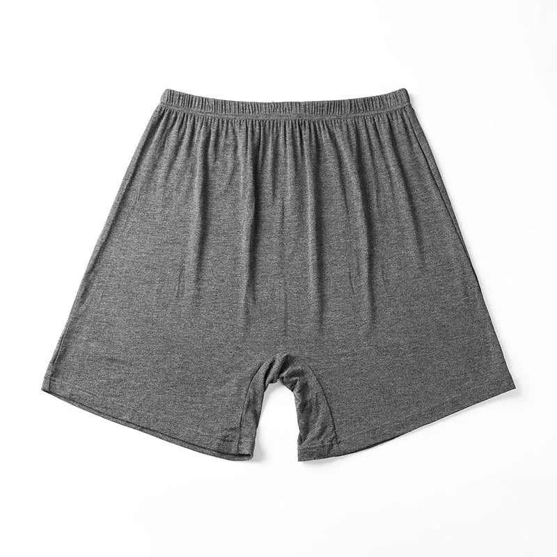 Mannequin wearing solid black high waist modal boxer shorts for men