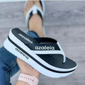 Women's solid colour platform slipper with herringbone toe detail on a PU upper and sole.