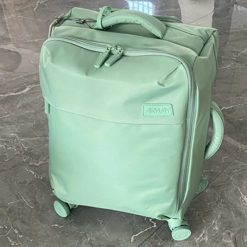 Ultra-light waterproof Oxford cloth suitcase with universal wheels in contemporary colour options