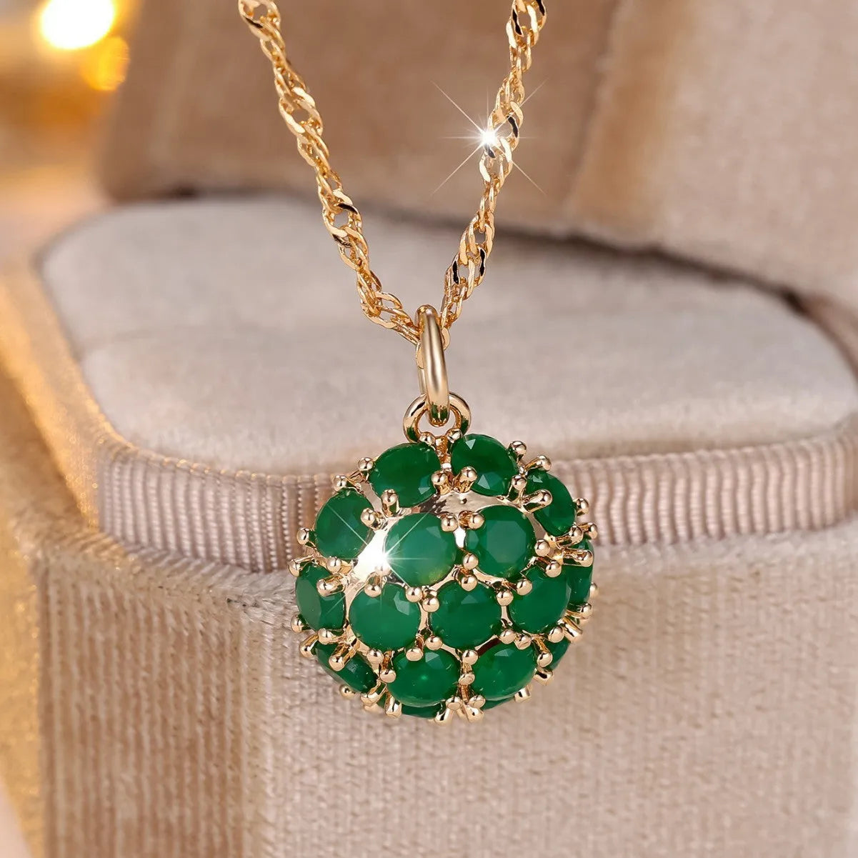 Copper electroplated women's necklace with round emerald diamond pendant on adjustable chain