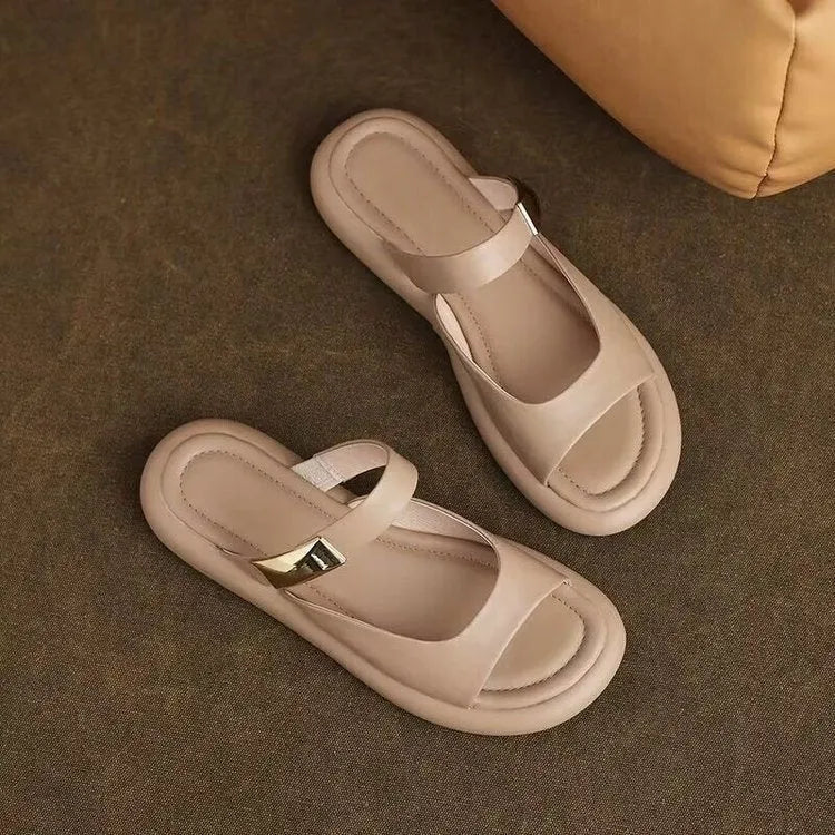 Women's apricot peep toe flat platform sandals made of soft leather with a rubber sole.
