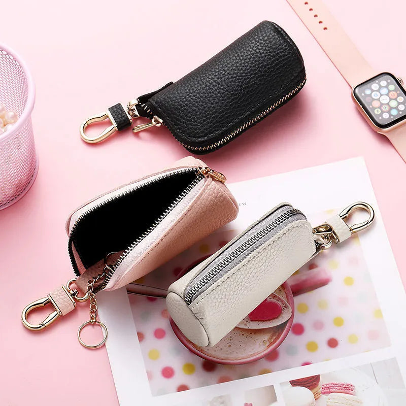 Simple men's zipper key case in black PU leather with minimalist urban design