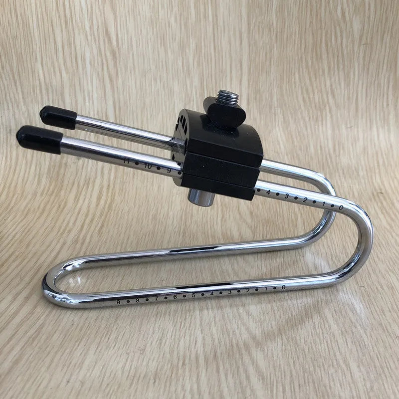 Black bicycle seatpost suspension device on bike showing spring steel alloy construction