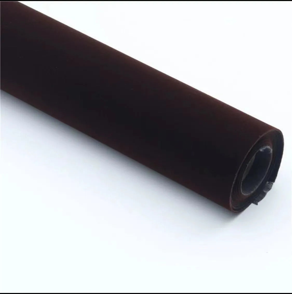 A sheet of self-adhesive black leather suede material with a ruler showing its 0.5mm thickness.