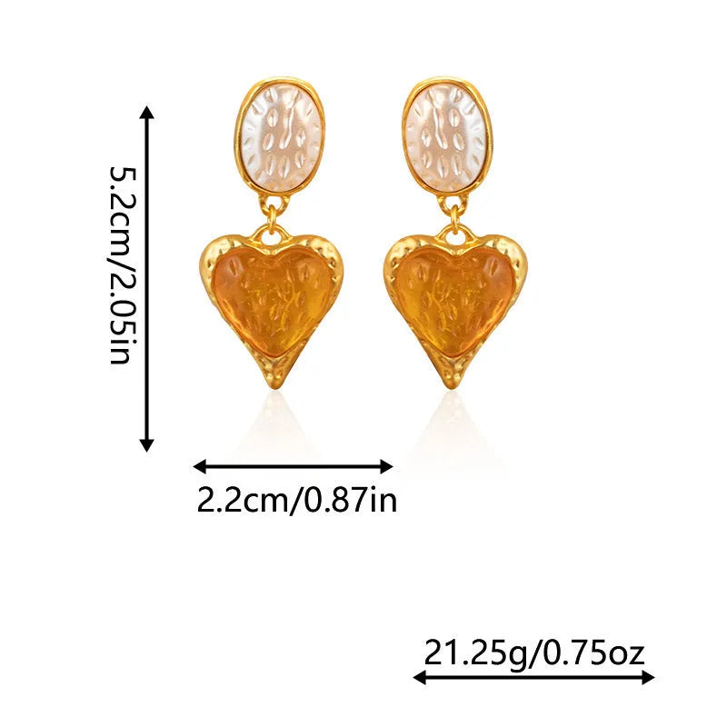 Pleated oval heart stud earrings in alloy showing four colour options