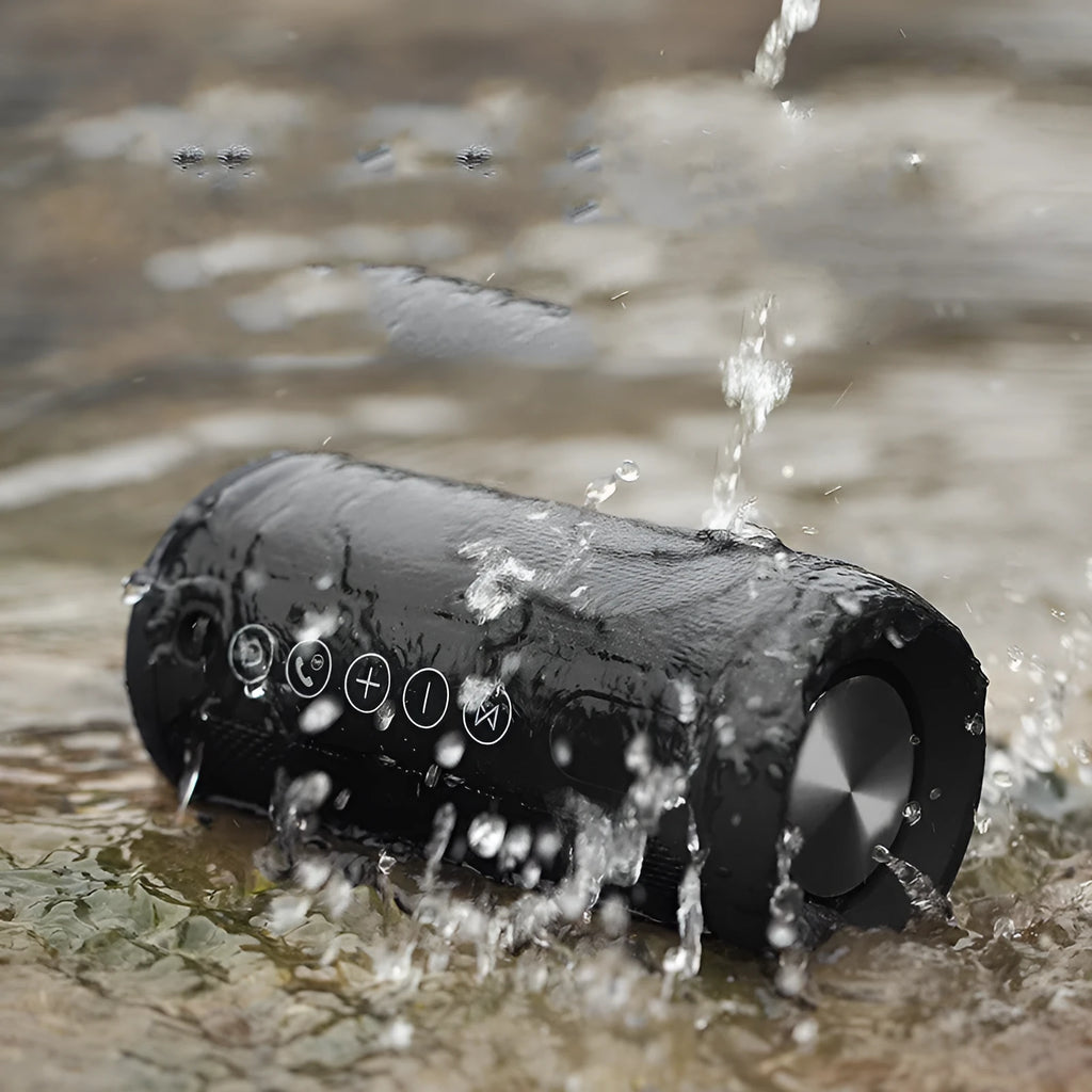 Outdoor waterproof portable speaker in black, camouflage, grey, or red colour with display showing Bluetooth, TF card, and AUX logos.