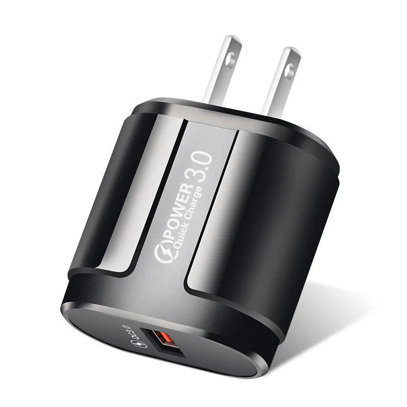 White and black international smartphone charger with UK, US and EU plug options