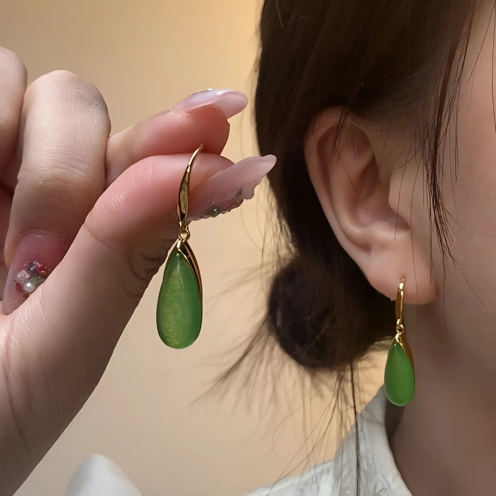 Geometric water droplet earrings with a jade green electroplated finish and Chinese retro style.