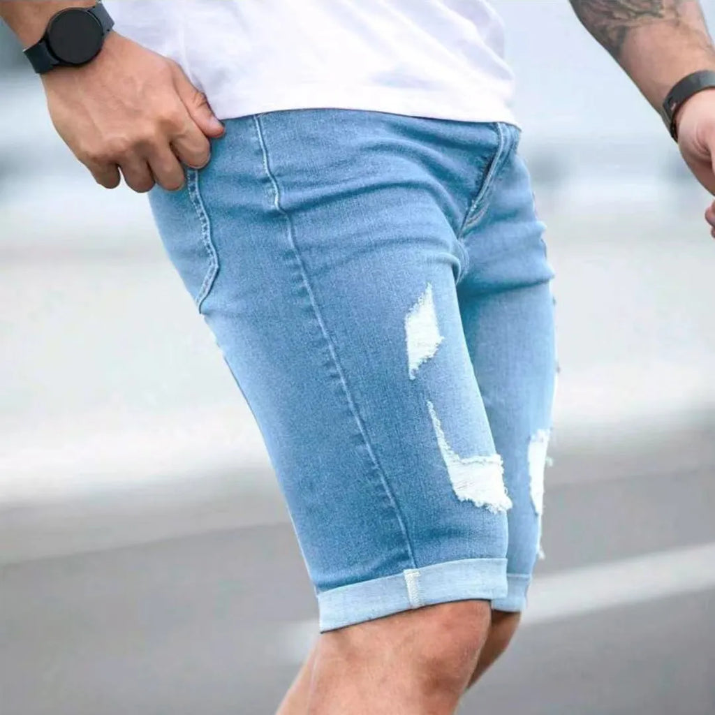 Sky blue denim shorts for men with multi-hole design and low waist straight cut