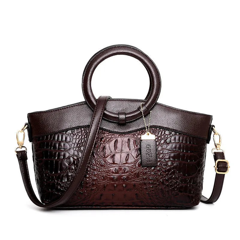 Ladies casual fabric handbag in multiple colours with zipper compartments, shown with shoulder strap.