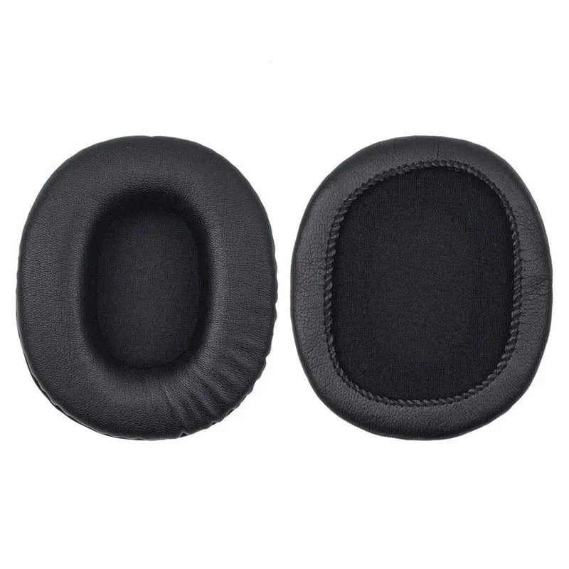 Two black PU leather headphone covers for Sony 1R headphones on a flat surface.