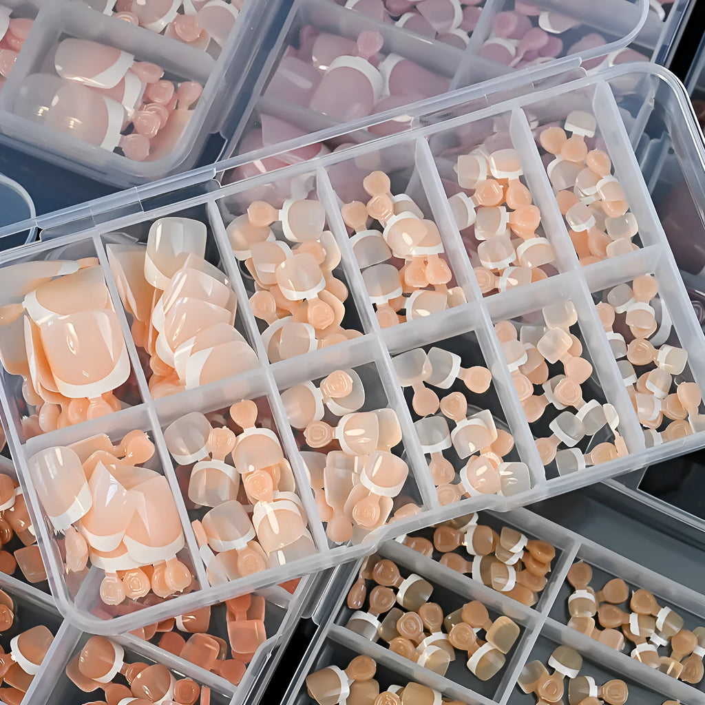 120-piece box of full square short French white tip nude press-on toenails in assorted shades