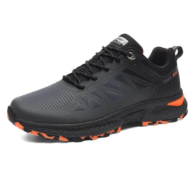 Men's black and orange breathable mesh running shoe with lace-up front and rubber sole