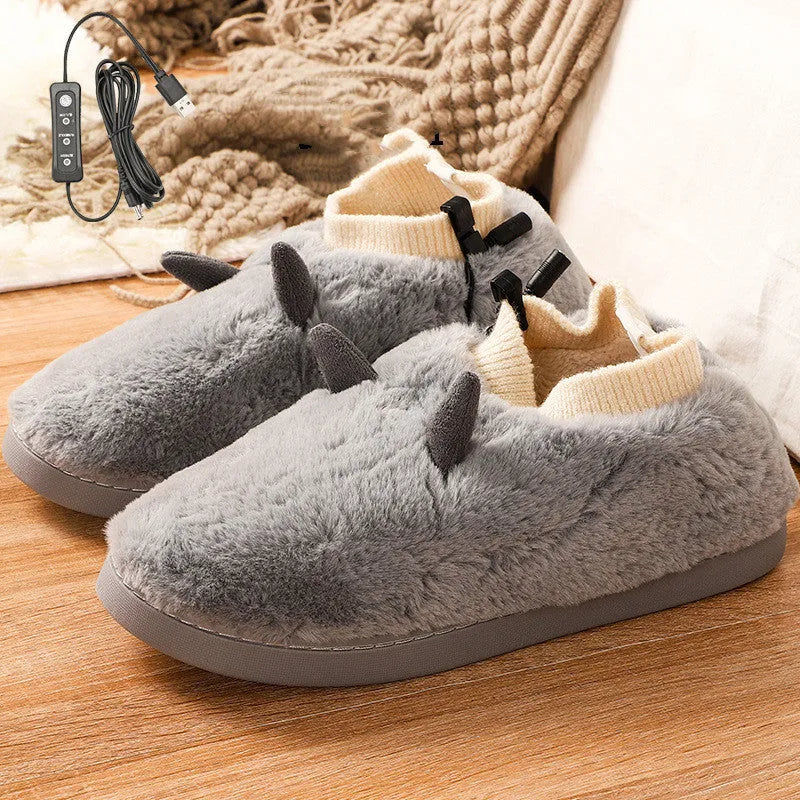 USB electric heating slippers in velvet, showing USB cable connection and adjustable temperature control.