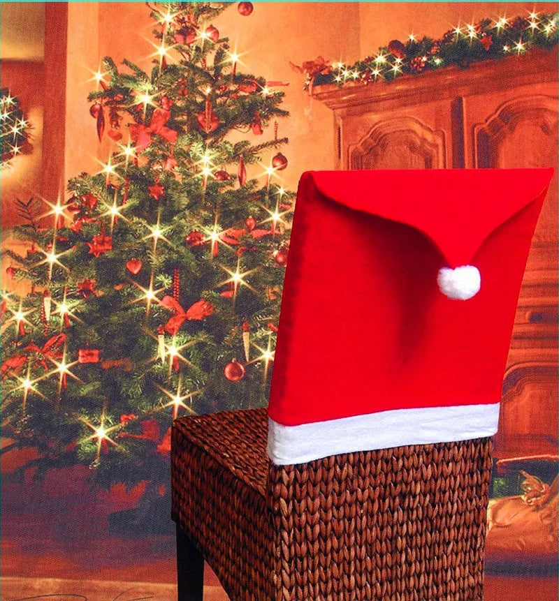 Christmas chair covers set with Santa Claus, Snowman, and Santa hat designs on dining chairs