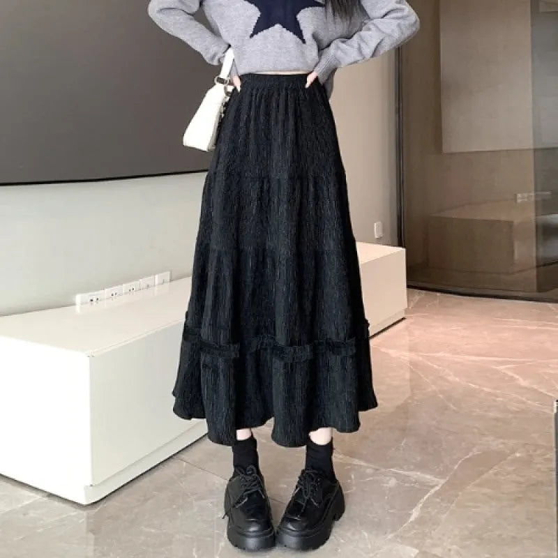 Corduroy A-line midi skirt with elastic waistband in milky white colour showing Korean style design
