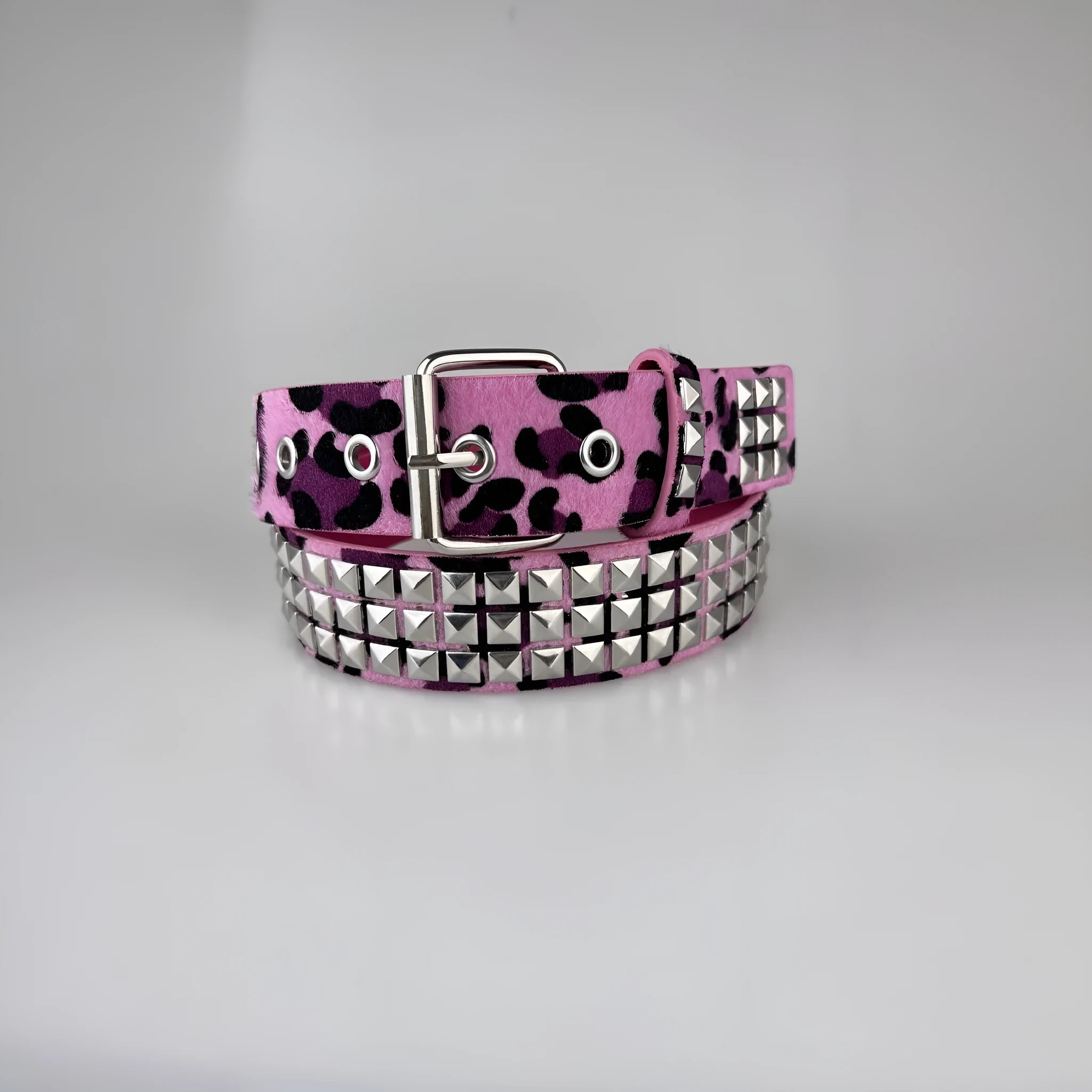 Women's punk fashion belt with metal rivets on a brown leopard print PU leather strap and alloy buckle.
