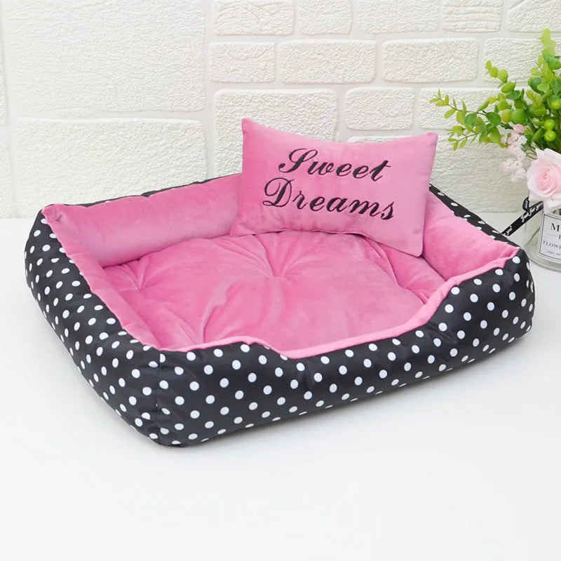 Polka dot printed square nest dog bed with removable embroidery pillow in grey, blue, pink, or red.