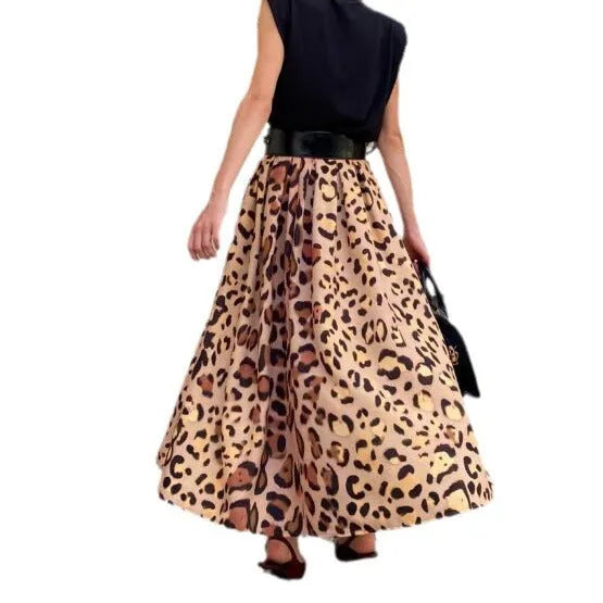 Women's brown leopard print A-line long skirt made from polyester fabric with an inelastic waist.