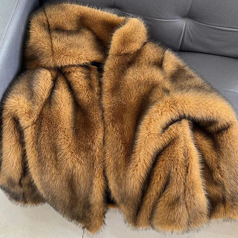 Silver grey artificial fur coat with regular sleeves showing loose fit mid-length design