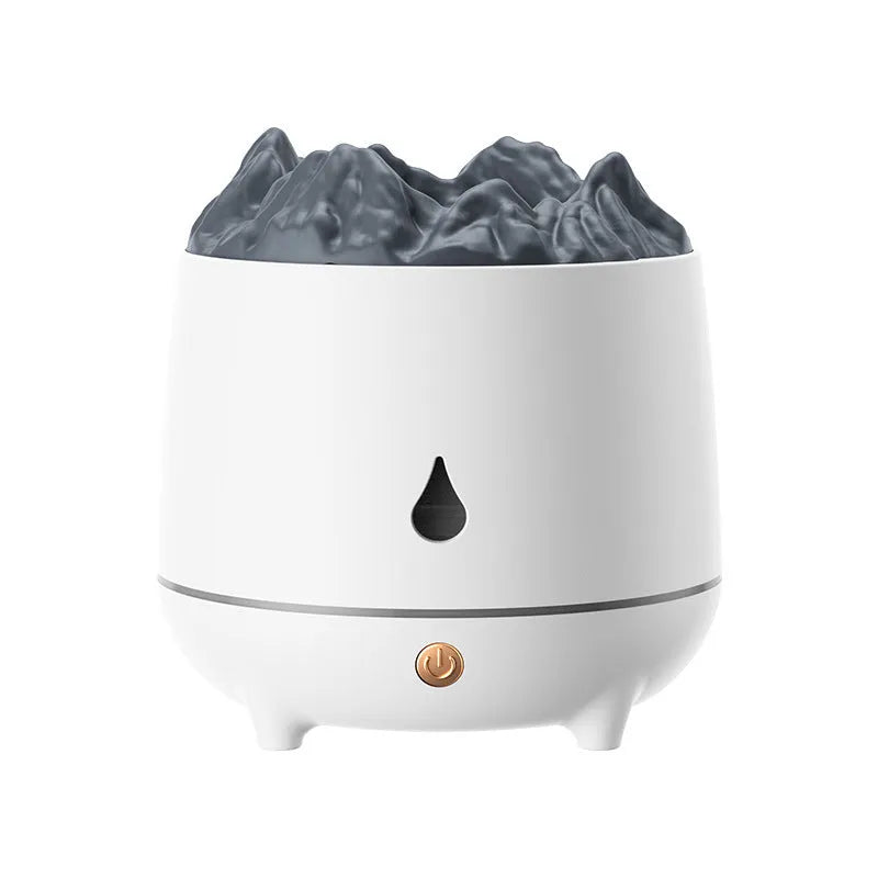 Black volcano-shaped ultrasonic humidifier with USB cable on wooden desk emitting mist