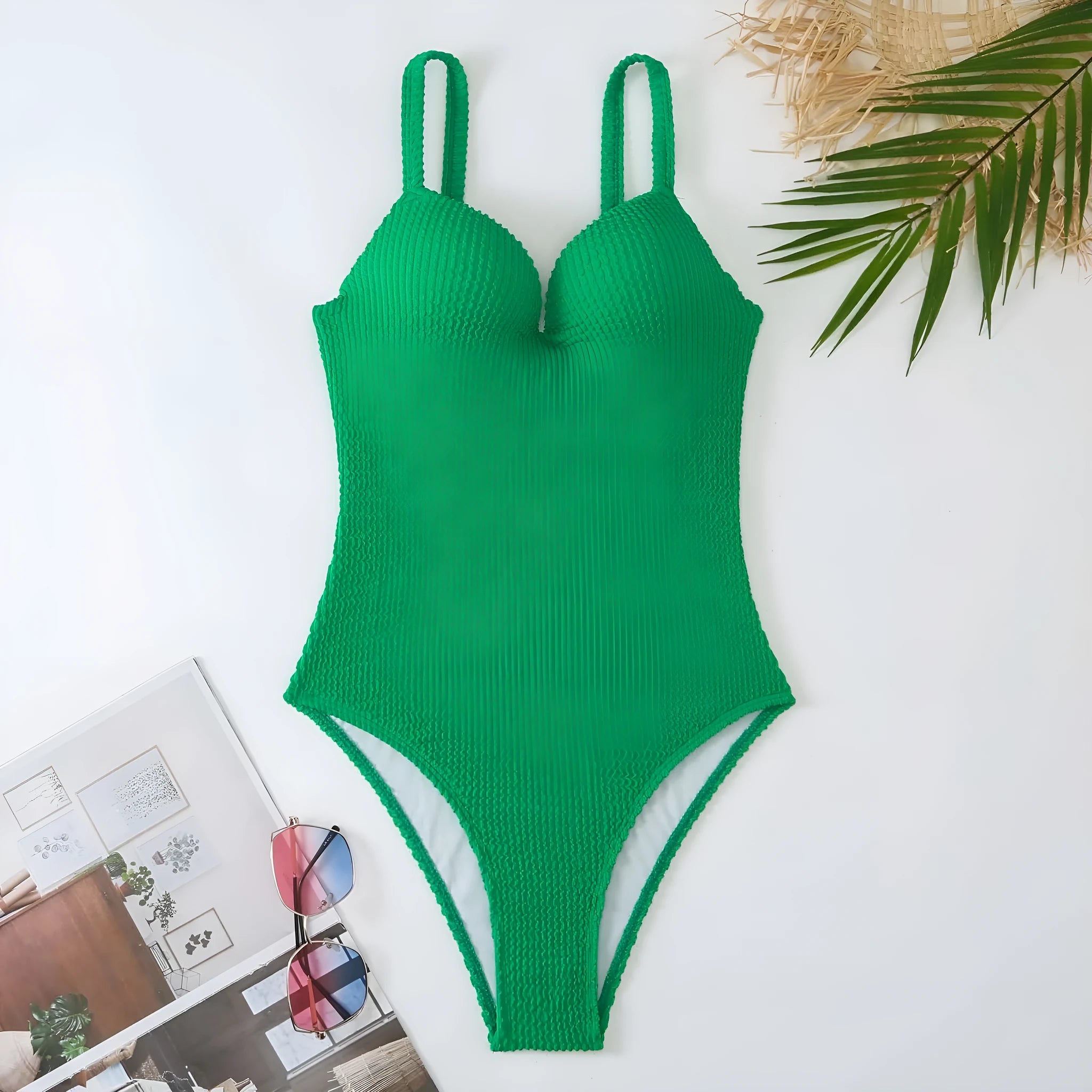 Women's sleeveless one-piece swimsuit with sunken stripe pattern in multiple colour options
