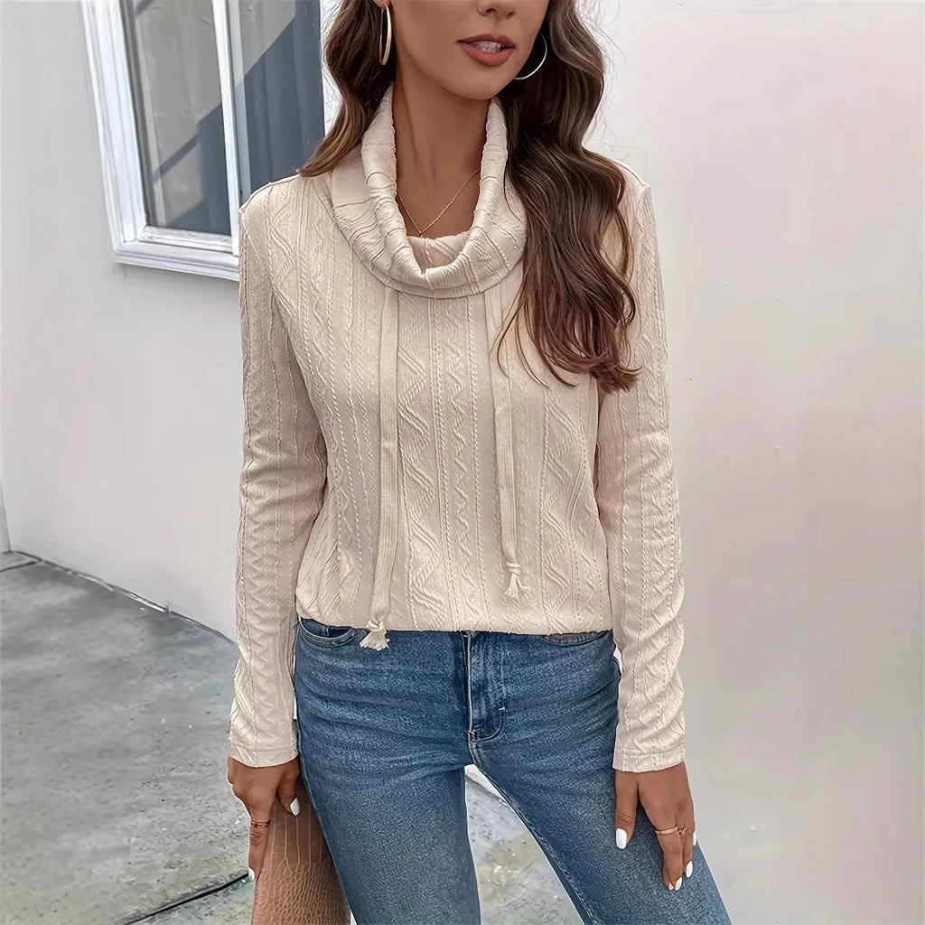 Apricot coloured hooded pullover sweater with drawstring and long sleeves